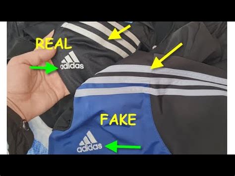 how to tell fake adidas tracksuit|adidas true and false.